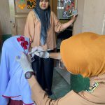 Pemeriksaan Kesehatan Grastis di Sekolah oleh Puskesmas Pasar Ambon